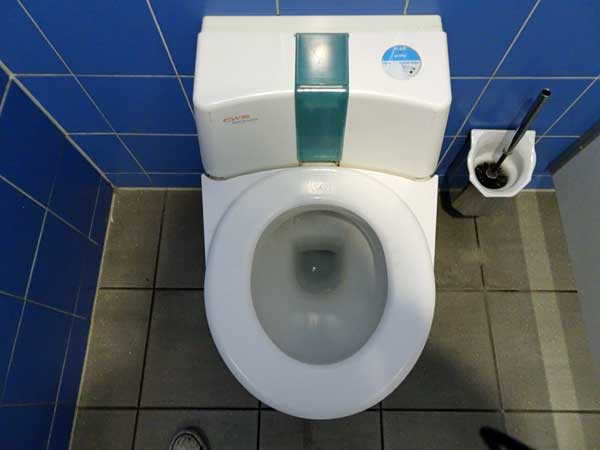 self-cleaning toilet in operation at a fuel station in germany on august 9, 2019