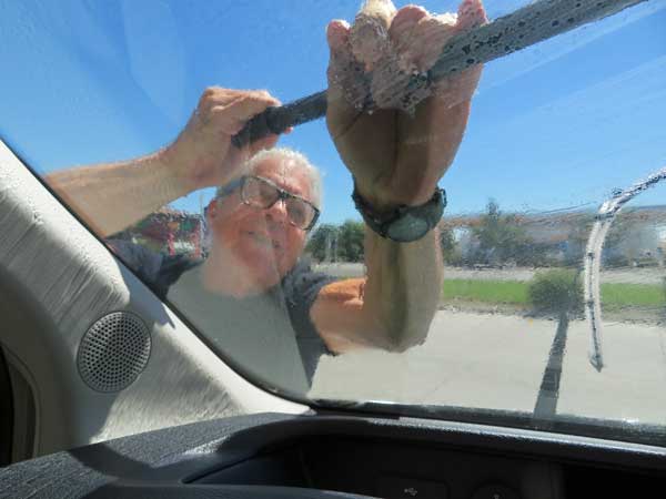 hodge cleaning the windshield of the new boat in williams, ca on september 9, 2023