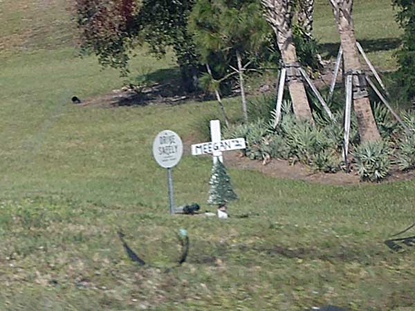 roadside marker for traffic death on I-75 headed to tampa from opa-locka, florida on october 24, 2023