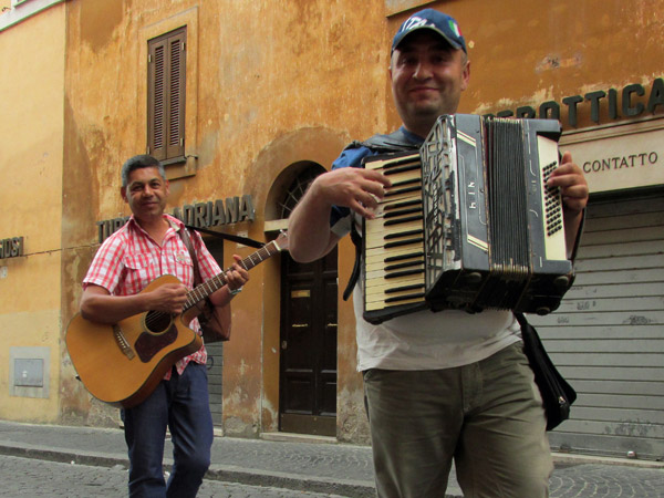 street musicians near vatican city in rome - july 3, 2013