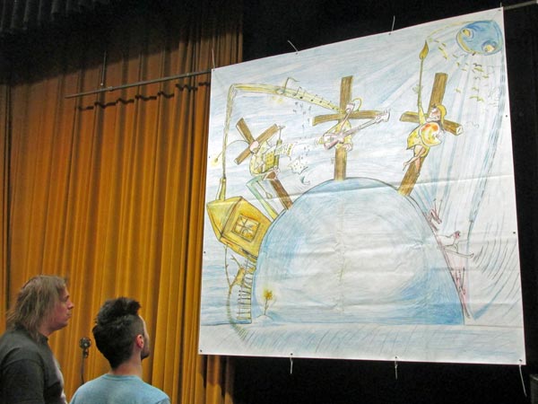 adam + jarda looking at stage banner created by martin velisek in usti nad labem, czech republic on may 28, 2015