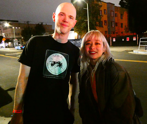 chris corsano + victoria shen (l to r) outside the boat at 'thee stork club' in oakland, ca on oct 30, 2024