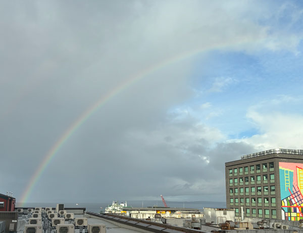 rainbow from sandy glaze's window in seattle, wa on oct 27, 2024