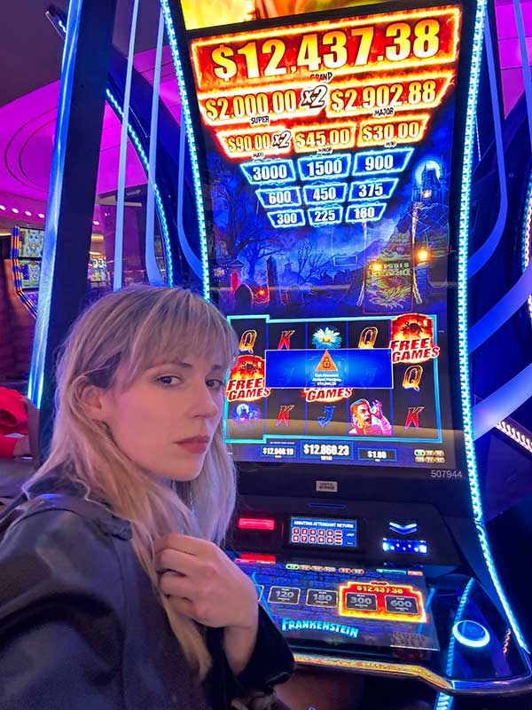 robin hatch's photo of herself and a gambling machine that won for her in detroit, mi on february 27, 2024