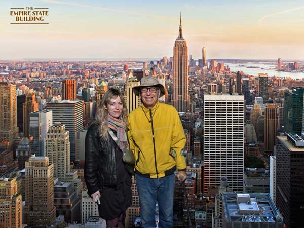 a.i. generated photo of robin hatch (l) + mike watt (r) at the top of the empire state building in new york city, ny on march 8, 2024
