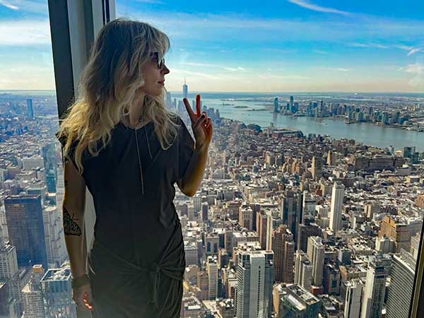 mike watt's photo of robin hatch at the top of the empire state building in new york city, ny on march 8, 2024