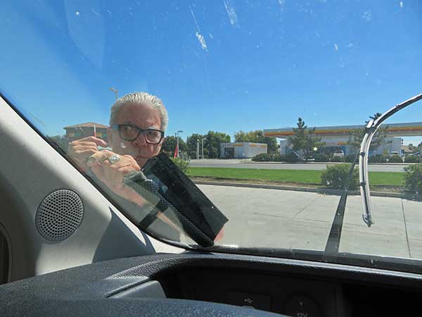 hodge cleaning the windshield of the new boat in williams, ca on september 9, 2023