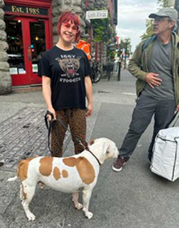 hodge's photo of sandy glaze w/her dog meatball in seattle, wa on september 12, 2023 - mike baggetta is to right of them