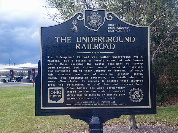 sign commemorating 'the underground railroad' at service area on ohio turnpike on october 7, 2023