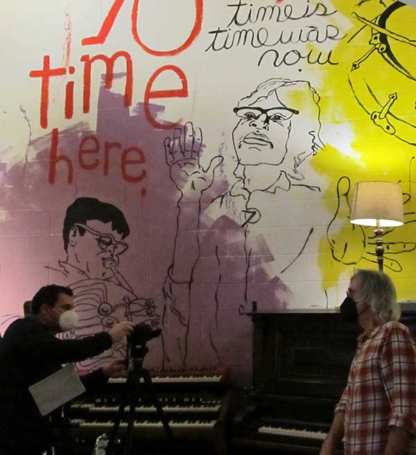 mike baggetta (on right) at 'crackle and pop' studio in seattle - tim kerr mural on the bulkhead