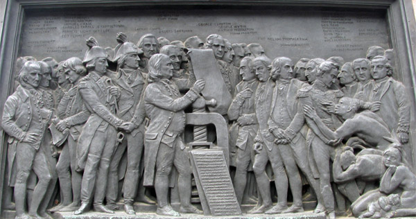 one side of base of gutenberg statue in strasbourg, france