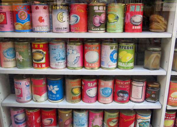 cans of abalone in a windown in melbourne's chinatown