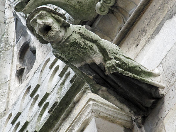 non-devil gargoyle on cathedral notre dame on august 23, 2011
