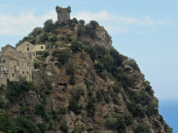 hill cliff  tower fort in nonza, corsica on july 24, 2011