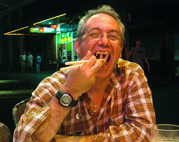mike watt in sydney's chinatown chowing squid on january 25, 2011