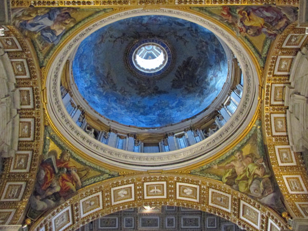 looking up at cupolo inside saint peter's basilica, vatican - july 3, 2013