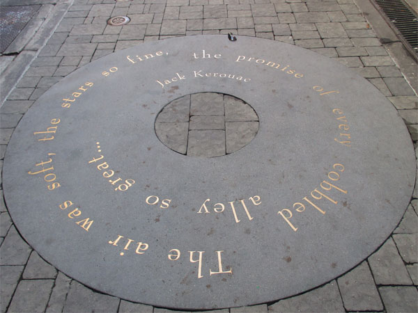 jack kerouac quote in alley next to 'city lights booksellers & publishers' in san francisco, ca on november 3, 2015