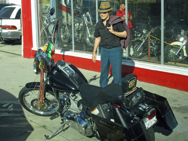 tav falco outside century motorcycles in san pedro, ca on october 30, 2015