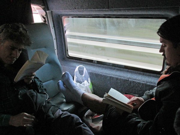 tom watson + raul morales reading on the ride to southampton, england on april 18, 2014