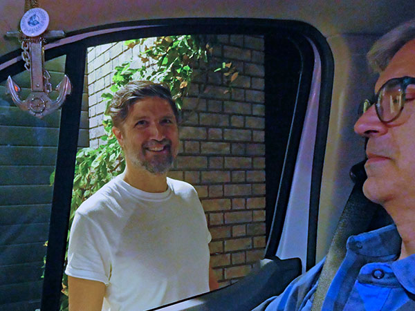 tucker (l) + mike baggetta (r) in front of 'flora' in portland, or on october 4, 2026