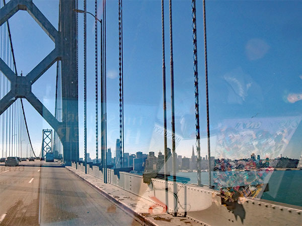 heading west on the bay bridge towards the city