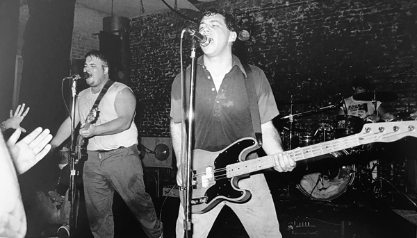 mike watt w/the minutemen at the mabuhay in san francisco, ca in 1984 - photo by murray bowles